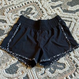 Jessica Simpson medium athletic shorts black with animal print trim
